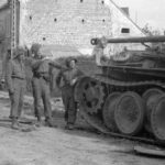 60f226d64bd2b821660fb5af_German-PzKpfW-V-Panther-tank-knocked-out-near-Bn-HQ--Bretteville-lOrgeuilleuse--France--8-June-1944---MIKAN-No--3405774